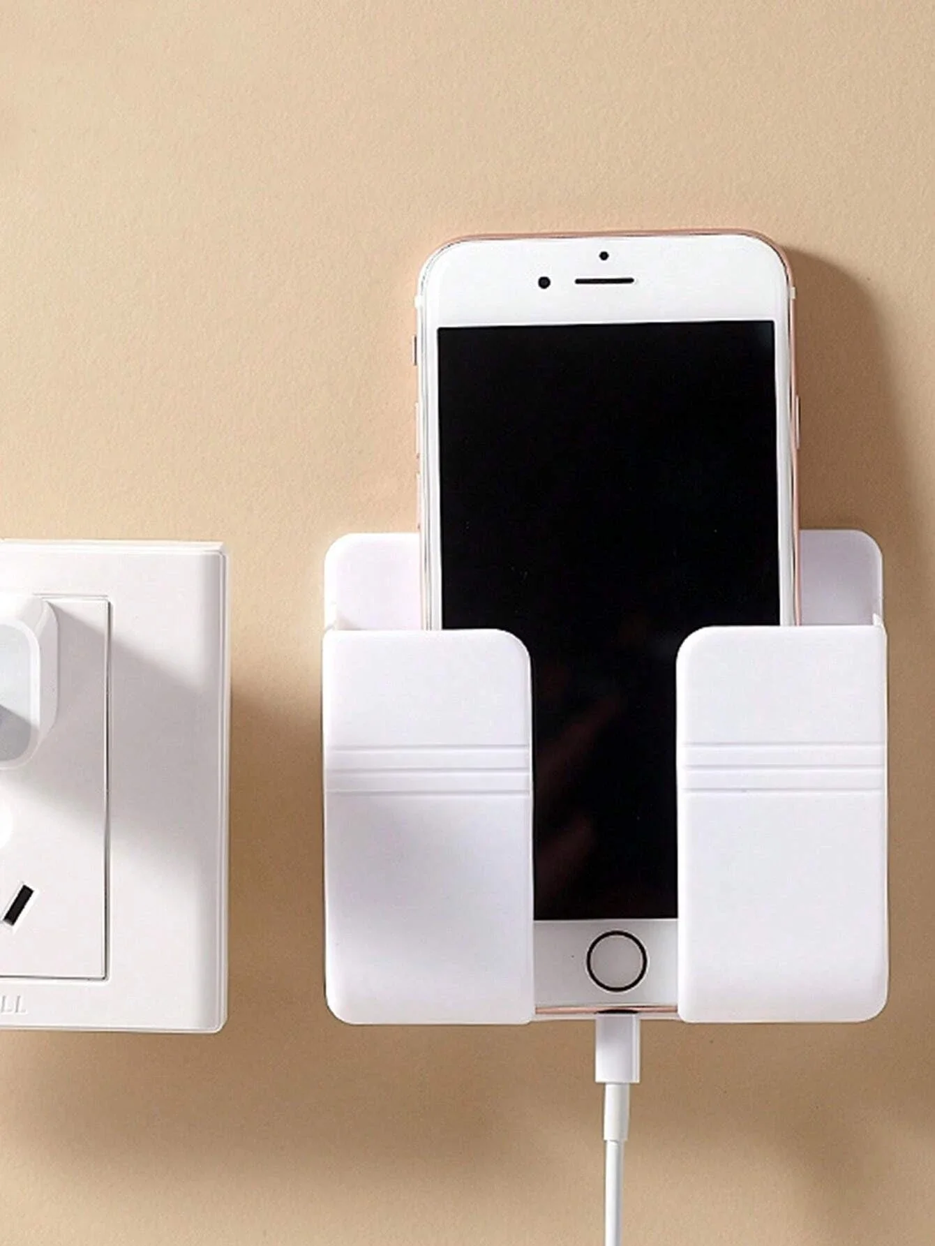 1 soporte para teléfono montado en la pared.