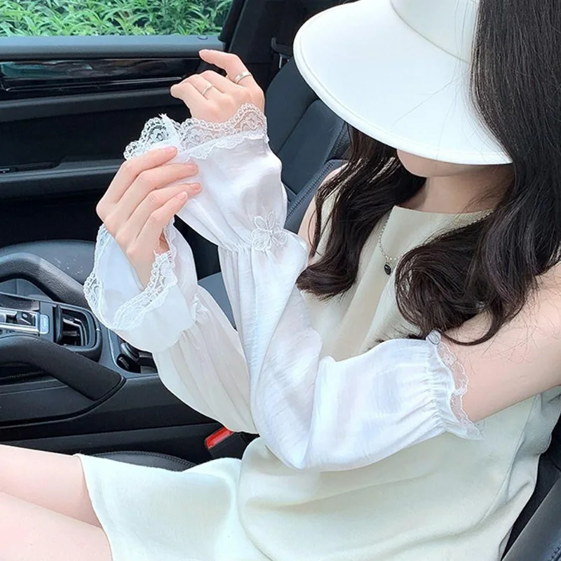 Maniche di protezione solare con fiocco in pizzo Donna Moda coreana Maniche larghe in seta di ghiaccio Estate Anti-UV Parasole Ciclismo Guida Manica lunga