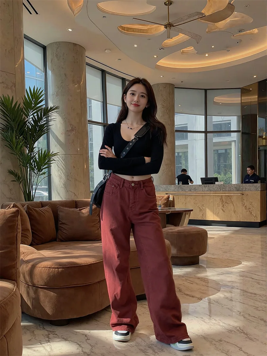 Jeans larghi rossi a gamba larga da pavimento Jeans larghi da donna con grafica bootcut occhielli candeggiati punti fori divisi linea trasversale cinese alla moda