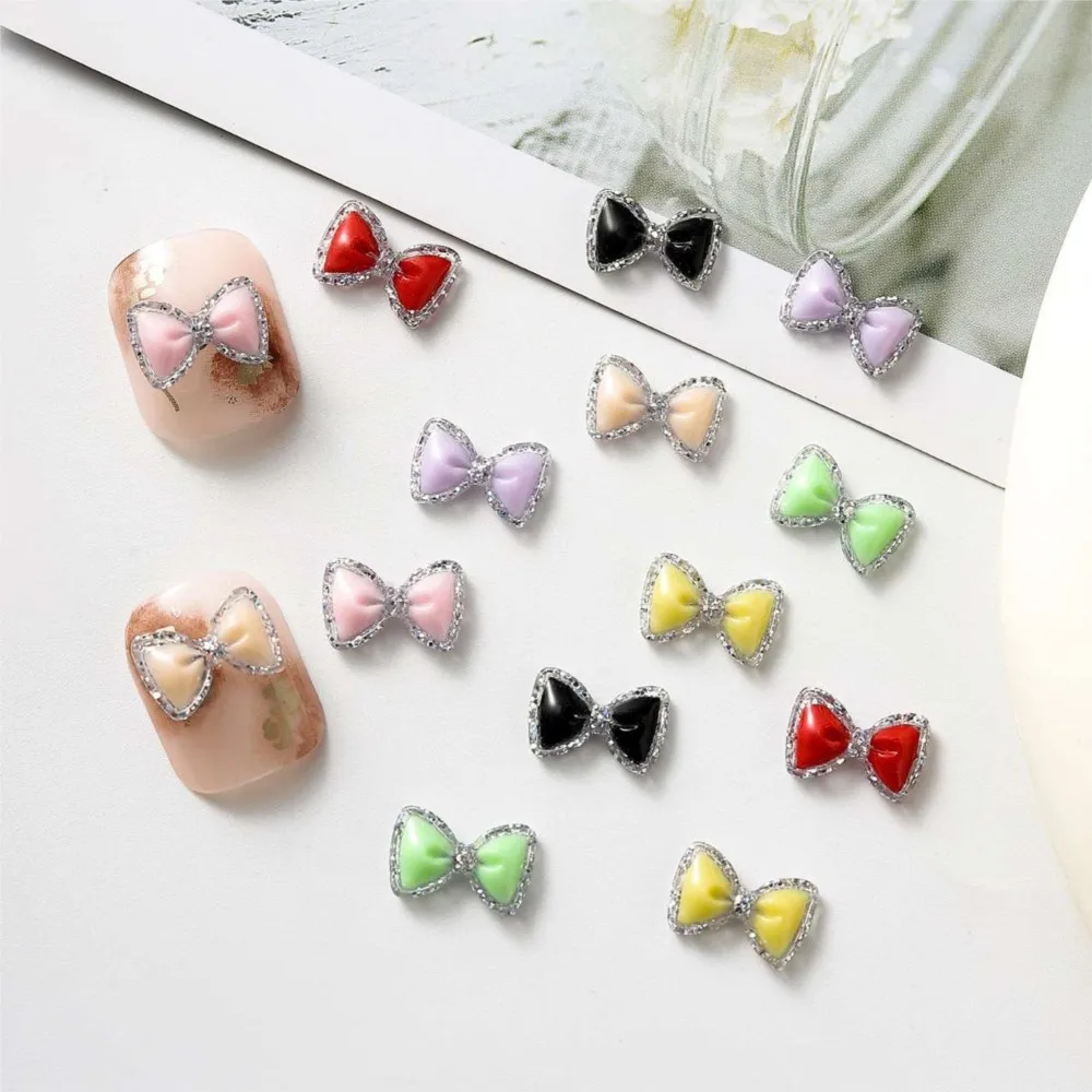 100 Uds pajarita luminosa dijes para decoración de uñas lazo de resina brillante accesorios para decoración de uñas pajarita de lujo para artesanía de manicura funda de teléfono