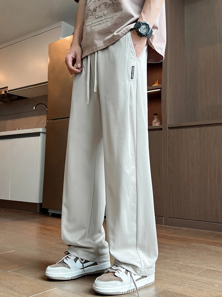 

Мужские летние тонкие спортивные брюки из ледяного шелка, свободные прямые повседневные длинные брюки, модные, брендовые, молодежные, из эластичного волокна