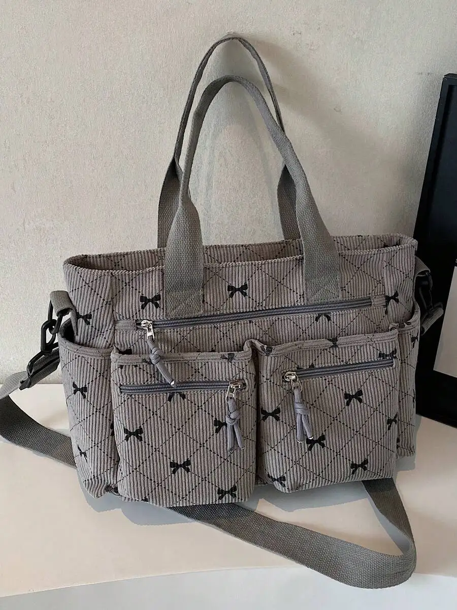 

Серая вельветовая сумка-тоут с принтом в виде банта, многофункциональная модель с множеством карманов для повседневного использования