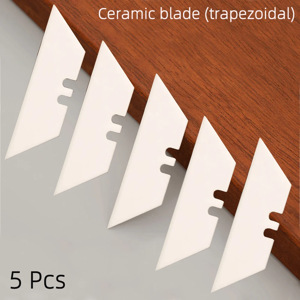 5 ceramic insulated trapezoidal blades that are rust free and non-magnetic for carpet cutting, paper cutting, and edge trimming