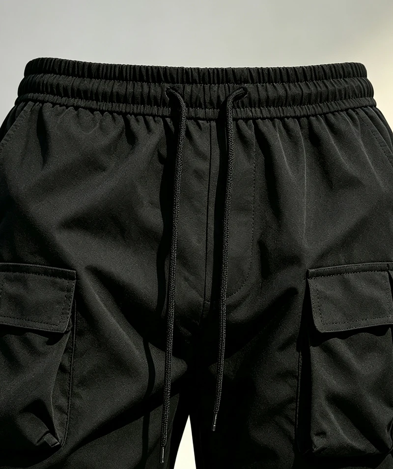 Herren-Cargohose mit mehreren Taschen, elastischem Bund und Kordelzug, locker geschnittene Hose mit geradem Bein, lässige Outdoor-Alltagshose für Frühling und Herbst – Detail 9