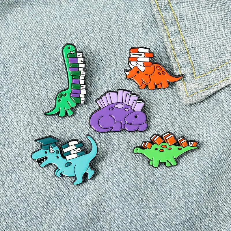 Dinosaur and Books Enamel Pin Custom Reading Habit Animal Brooch Bag Clothes Lapel Pin Badge Cartoon Jewelry for Kid Friend