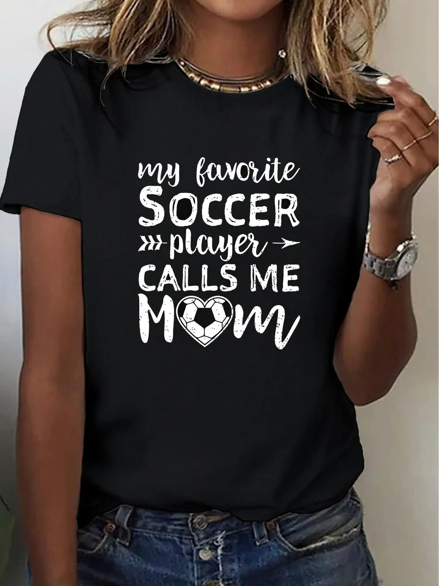 

Women's 100% 'My Favorite Soccer Player Calls Me Mom' Graphic T-Shirt Short Sleeve Crew Neck Tee with Heart Soccer Ball Design