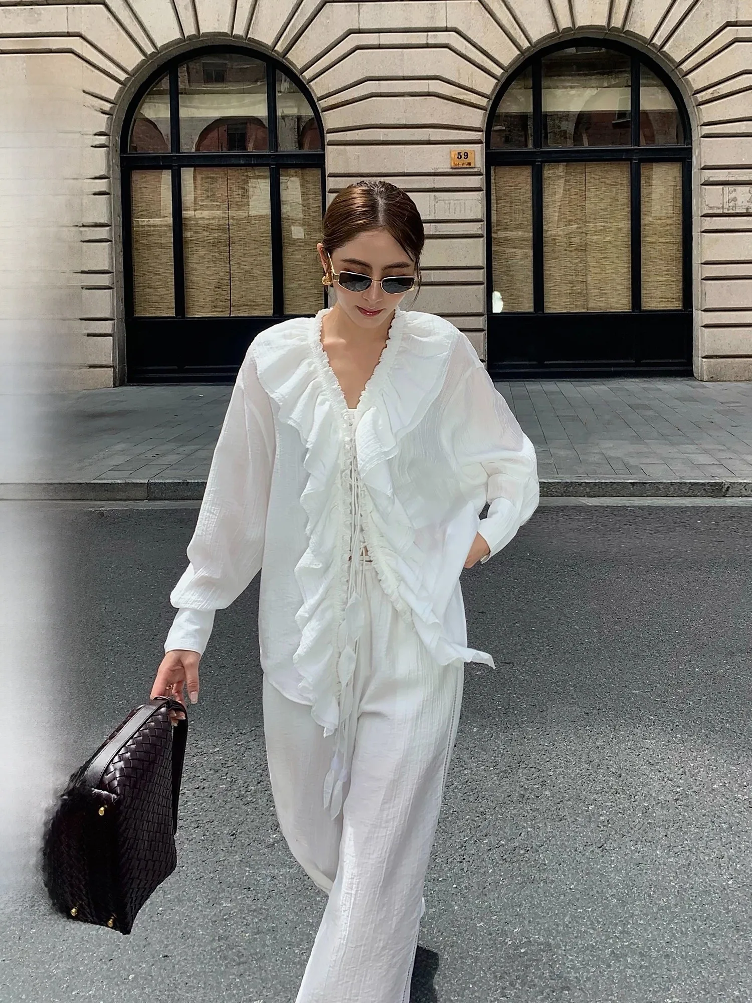 

Женский повседневный комплект NEVA HU: свободная блузка с V-образным вырезом, оборками и завязками на талии, длинные брюки из смесового полиэстера, модный стиль