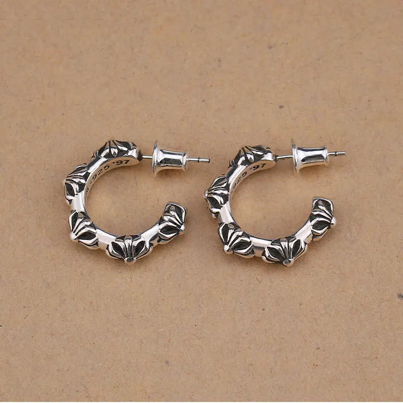 

European and American punk personality creativity 925 sterling silver cross earrings male and female creative earrings Thai si