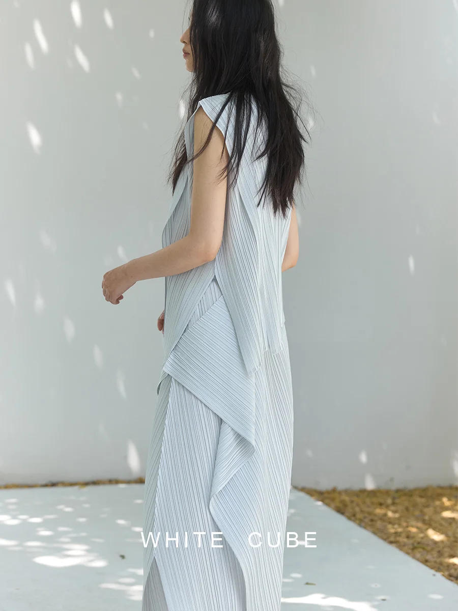 YUDX 2025 ensemble deux pièces plissé sans manches pour femmes haut à ourlet asymétrique et jupe mi-mollet argent décontracté vêtements de mode quotidiens