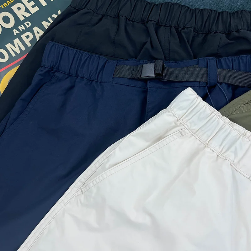 Celana pendek kasual longgar musim panas celana kuartal di atas lutut kaki lurus retro Amerika pria