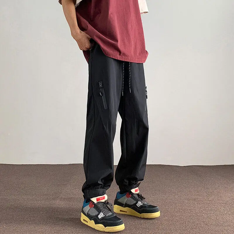 

Large Size M-5XL Mens Black Color Casual Pants 2025 Spring Autumn Streetwear Loose Pencil Pant Outdoor Waterproof Jogger Trouser