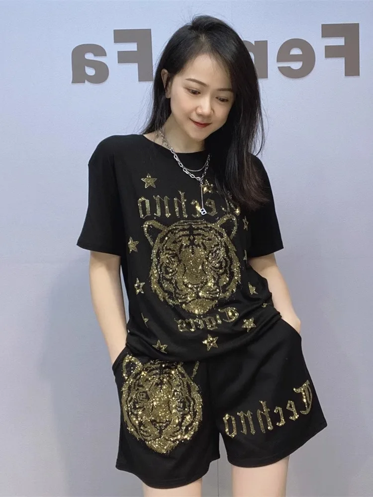 

Casual Summer ort Sve ort Pants Women's Set European Sle Women's Faion T-irt Two-Piece Set Diamond Heat Treaent