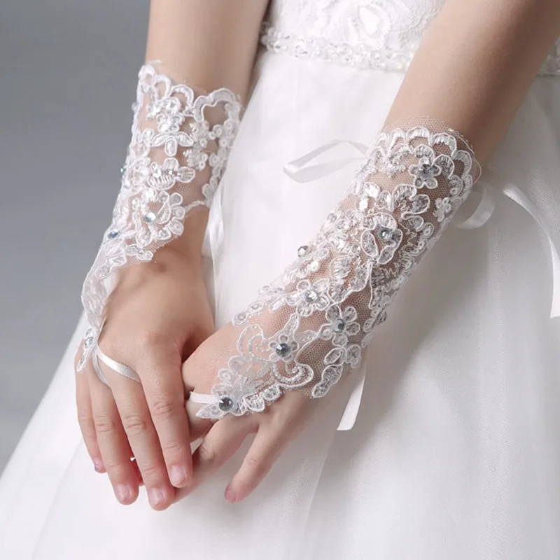 Lace and diamond-encrusted children's dress gloves and fingerless girl's dance gloves