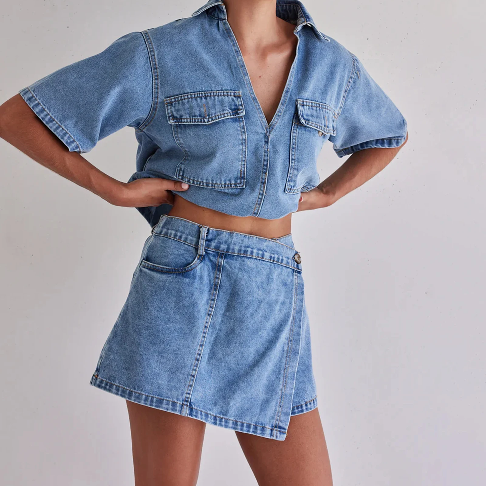 Combhasaki Women 2Piece Denim Outfits Set Short Sleeve Lapel V-Neck Pullover Crop Tops + Irregular Skirted Shorts with Pockets