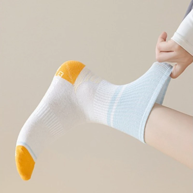 1/5 Pairs اليوغا بيلاتيس امتصاص الصدمات سيليكون المضادة للانزلاق الرياضة منتصف جوارب أنبوبية اللون حجب امتصاص العرق جوارب أنبوبية طويلة