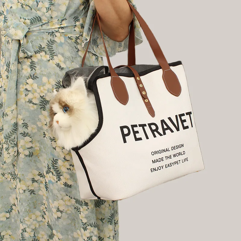 Bolsa bandolera transpirable para gato y perro con cabeza fuera