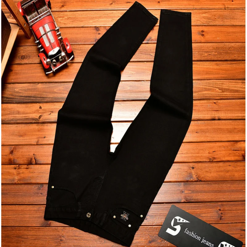 

High end black jeans men's autumn light luxury trend men's clothing small feet embroidered printed casual pants