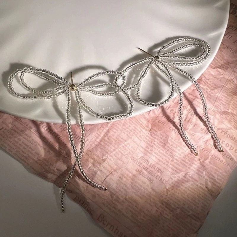 ترصيع أذن بعقدة فراشية للنساء والفتيات ، خرزات شرابات كورية ، أقراط متدلية على شكل قوس ، هدية مجوهرات الزفاف ، شريط رائع حلو