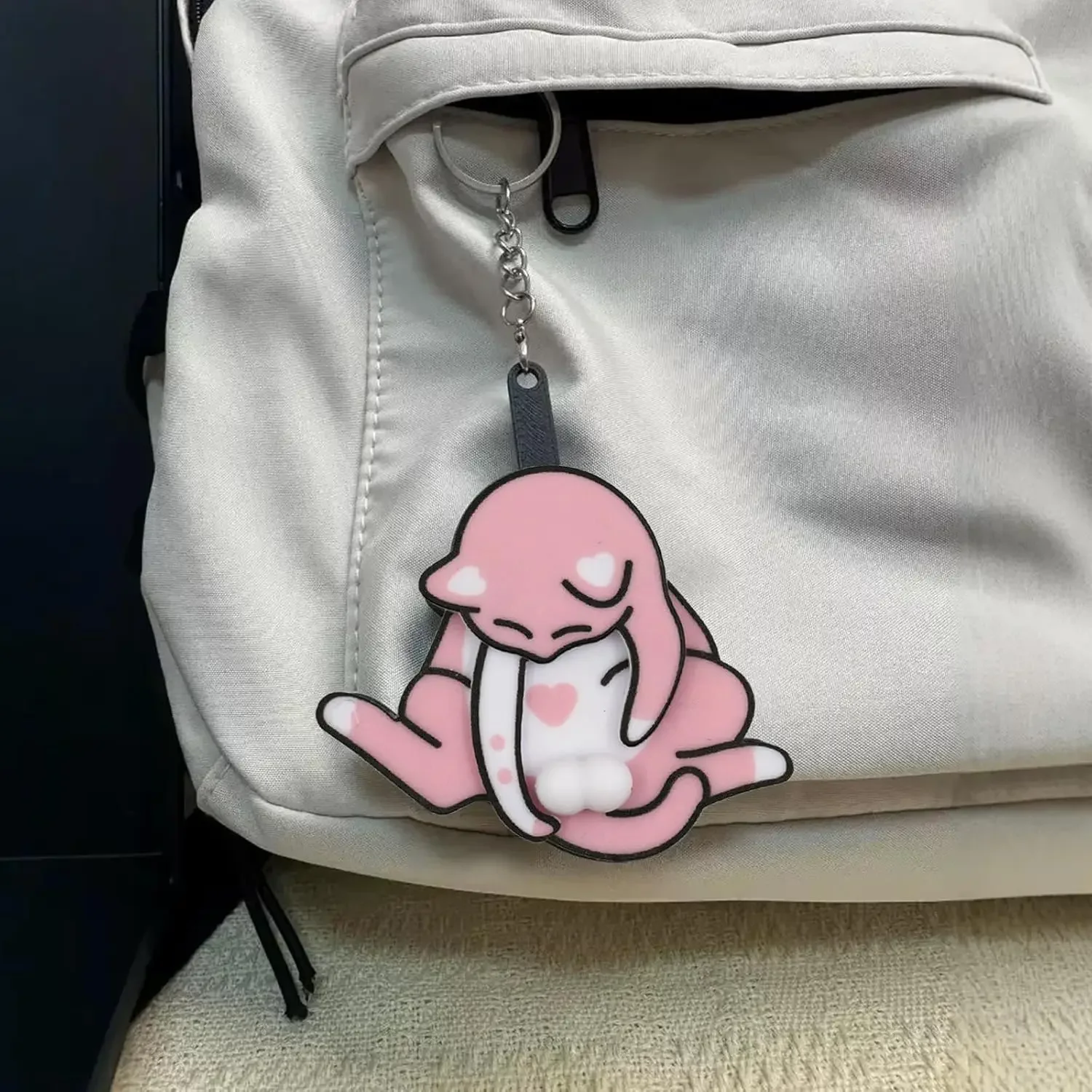 Adorable porte-clés rotatif en forme d'œuf de chat, jouet amusant et original, accessoire pour animaux de compagnie avec Clip pour sacs, parfait pour les chats ludiques, cadeaux réactifs