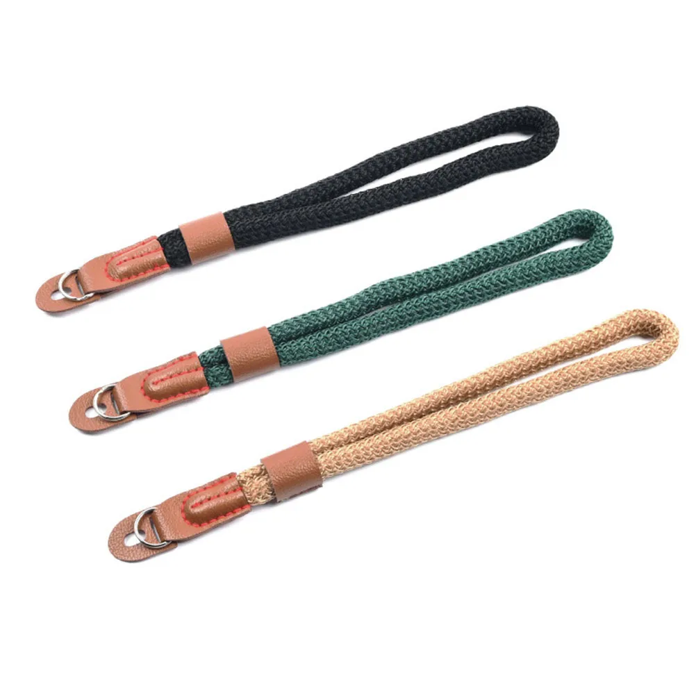 قطعة واحدة من حزام معصم الكاميرا البسيط من القطن القديم PU حزام معصم خفيف الوزن للكاميرا الرقمية ذات العدسة القابلة للتبديل