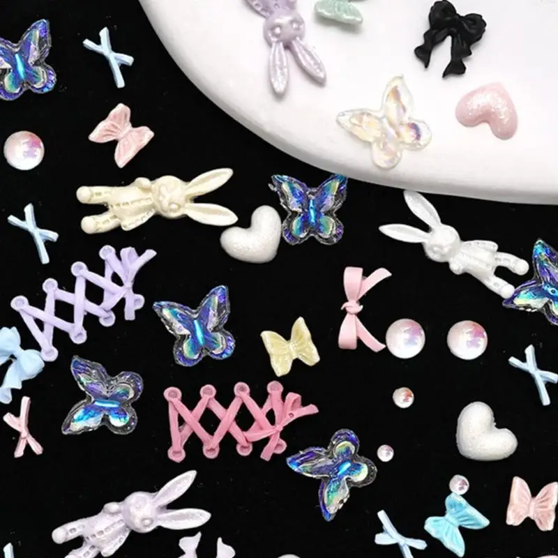 G99Eネイルチャームセット、弓蝶のハートネイルアートチャーム、カラフルなネイルアート用品