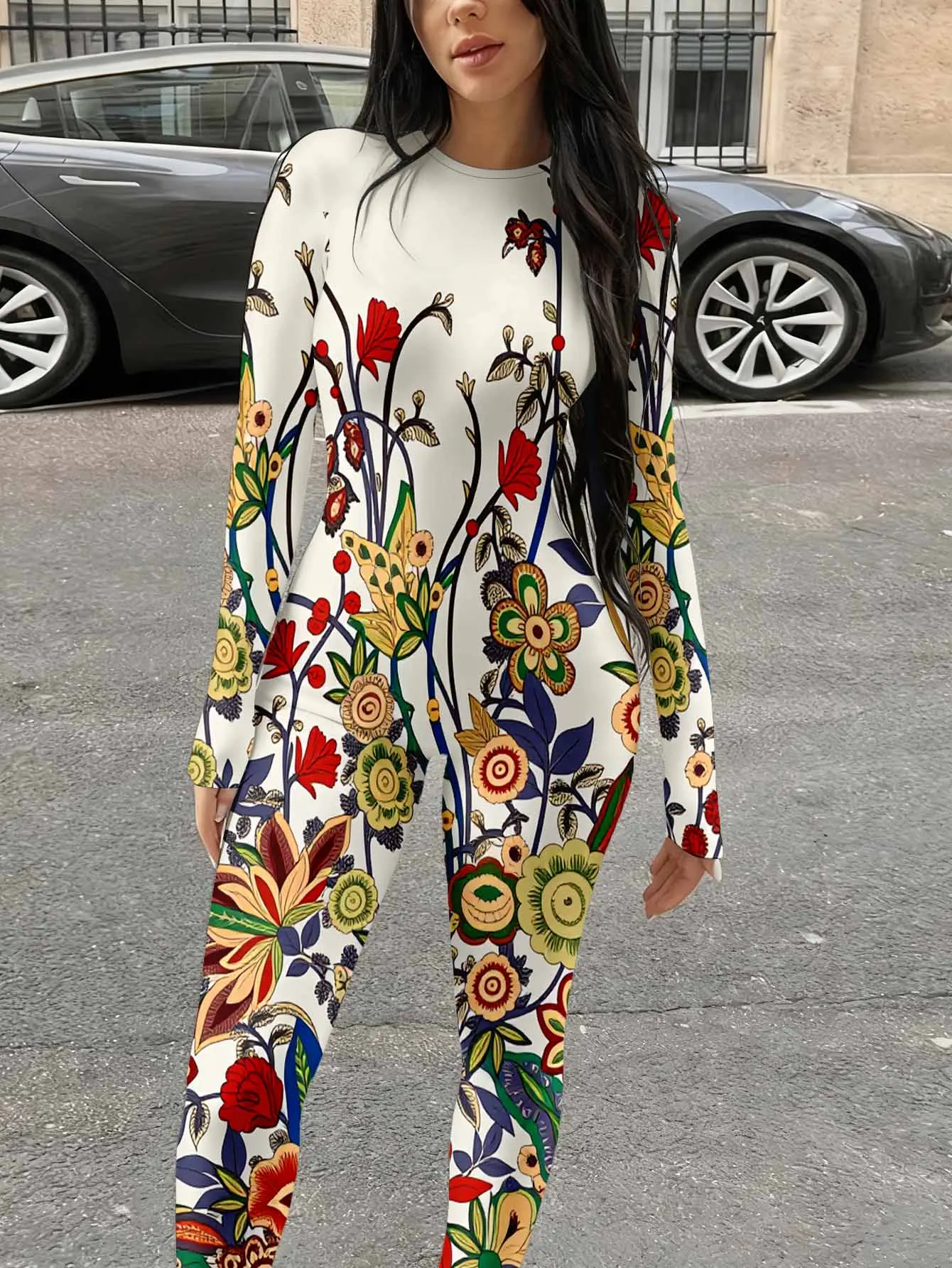 Tight long sleeved jumpsuit with round neck design and fabric for a smooth body shape