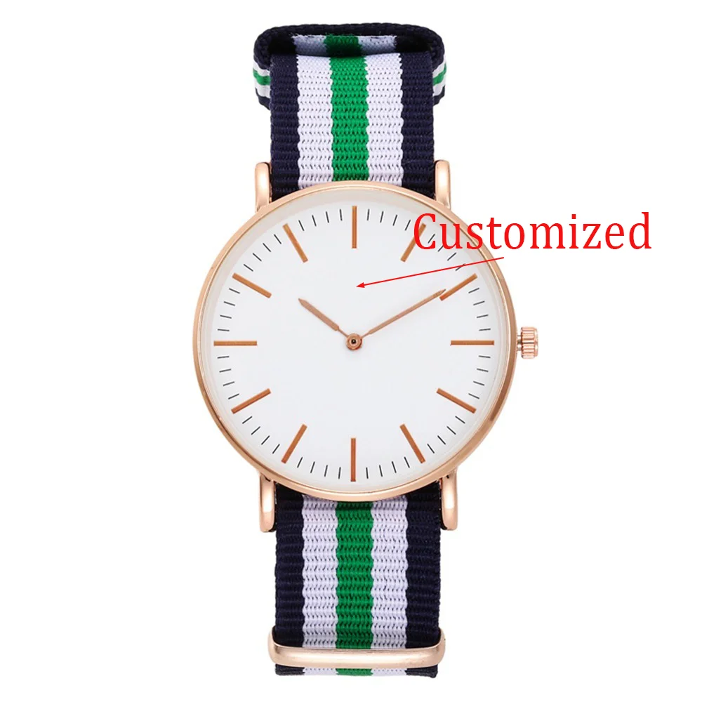 นาฬิกาควอทซ์สตรีแฟชั่นลําลองพร้อมสายไนลอนสายรัดผ้าใบเรียบง่ายการออกแบบสองพินนาฬิกามีสไตล์ที่ปรับแต่งได้
