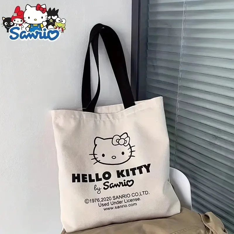 Sanrio-Bolso de mano de hello kitty para niña, bolsa de hombro de lona, gran capacidad de almacenamiento, bolso de Compras de moda, regalo para niñas