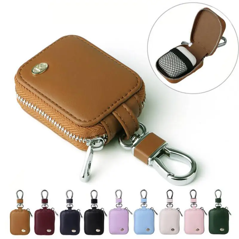 Portafogli chiave mini moda nuovo design tinta unita Borsa piccola per auricolari con cerniera in vera pelle carina con portachiavi per uomo donna