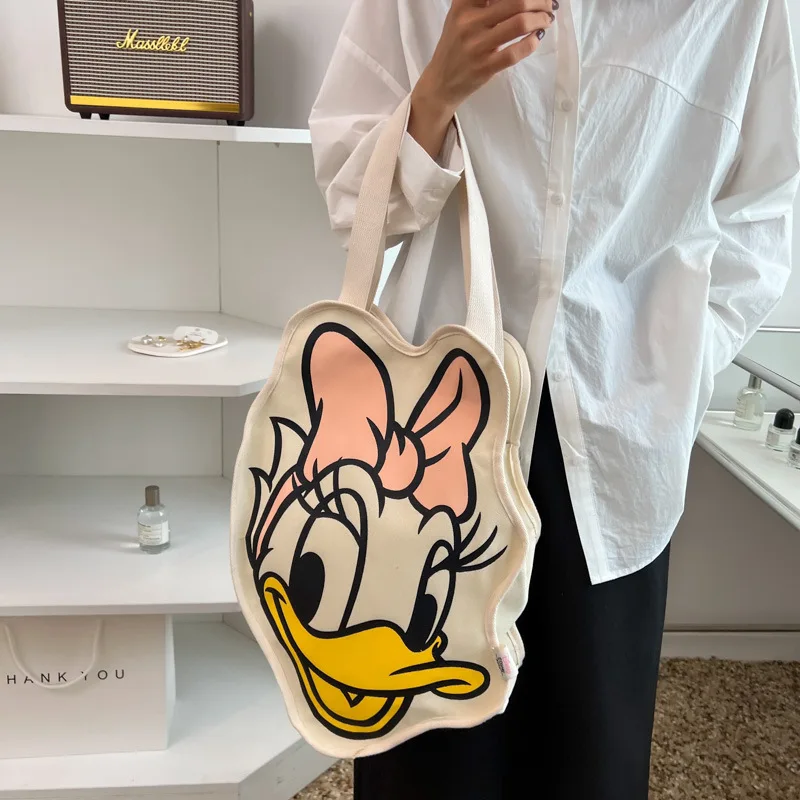 2023 New Disney Kawaii Anime Daisy Duck Canvas Cartoon Large-capacity Shopping Shoulder Bag Portable Fashion Girls Handbag Gifts