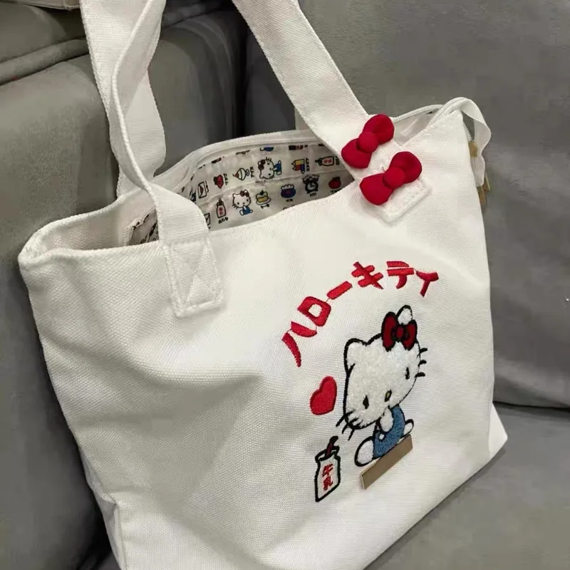 Miniso Hellokitty śliczne płócienne torby na ramię Cartoon haftowane białe torebki Zipper Casual Bookbags Y2k torebki dla dziewczynek