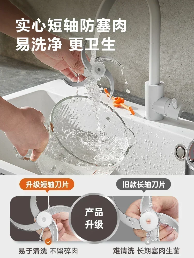 Household electric meat grinder. Small, automatic, multi-function. For minced meat, vegetables. Food supplement machine.