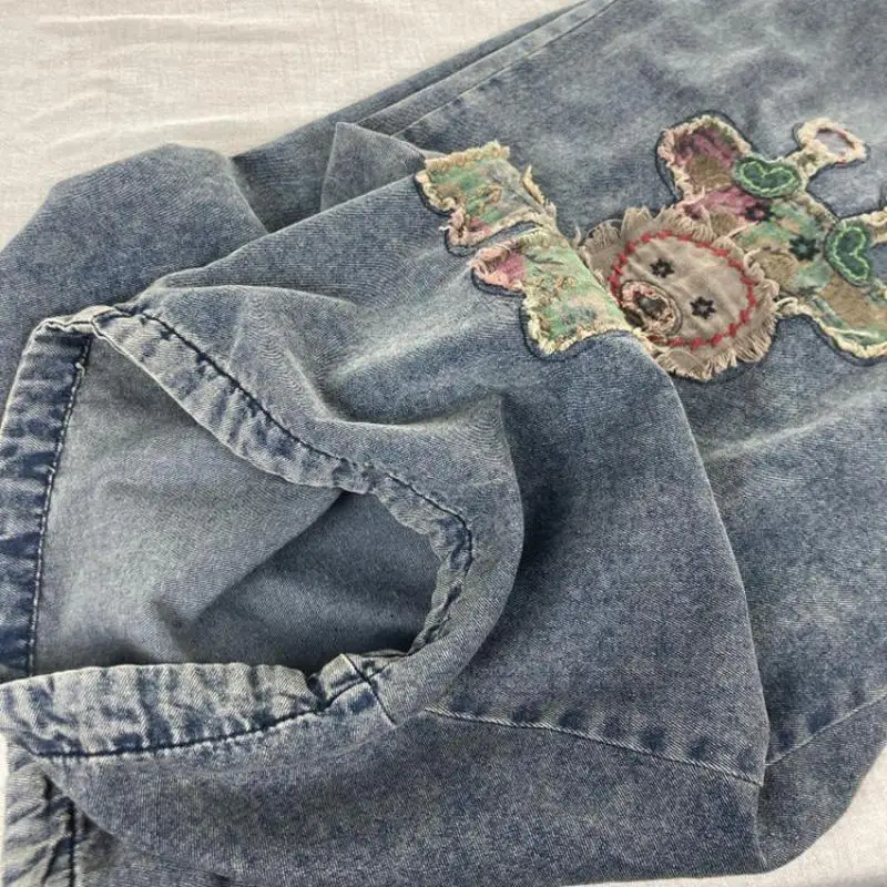 جديد وصول الصيف الفنون نمط المرأة مرونة الخصر القطن الدنيم العجل طول السراويل الكرتون نمط فضفاض خمر الحريم الجينز MT5