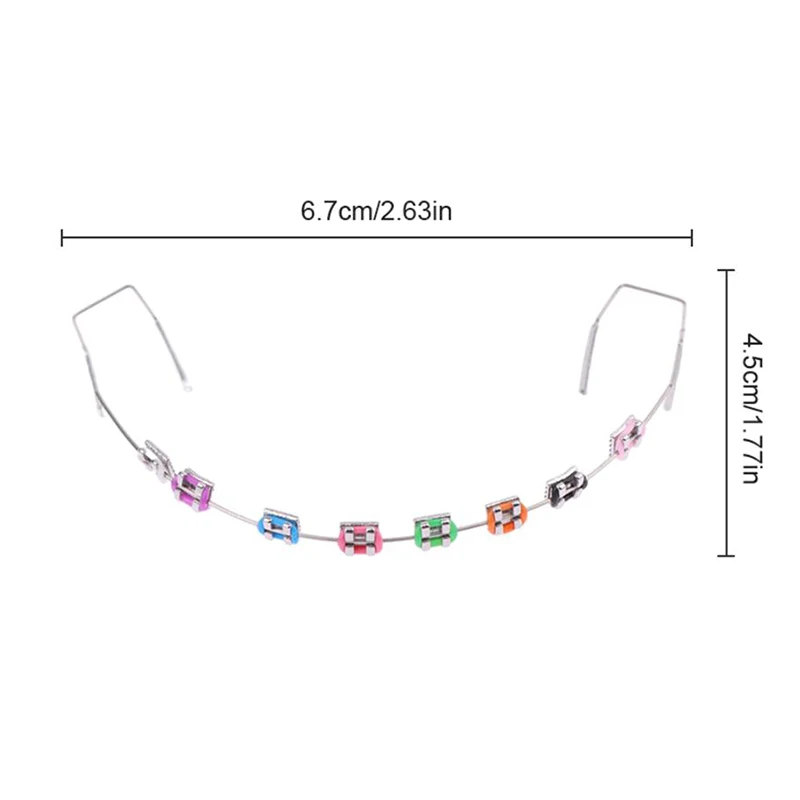 เครื่องประดับฟันชั่วคราวด้วยลวดโลหะ  ตัวยึดโลหะหลากสี และยางรัดจัดฟัน  ของตกแต่งทางทันตกรรม