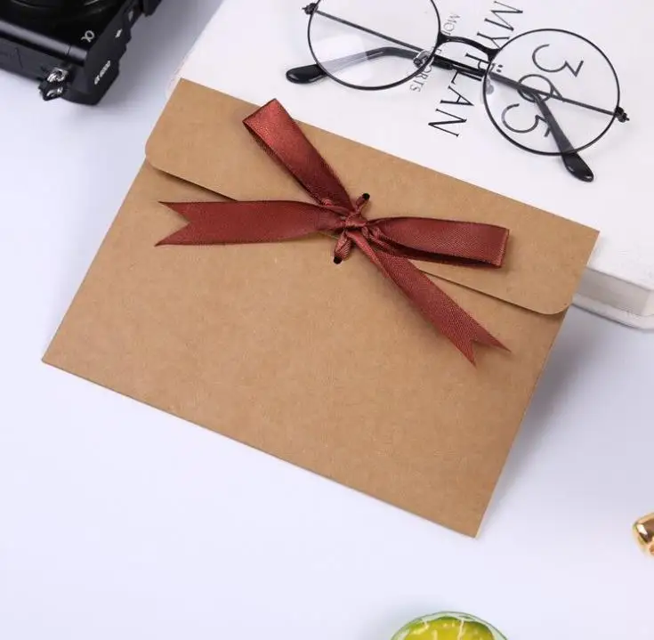 

500pcs/lot 24*18*0.7cm bow Envelope Kraft paper pocket bag Kerchief Handkerchief Silk scarf packing boxes Envelope box