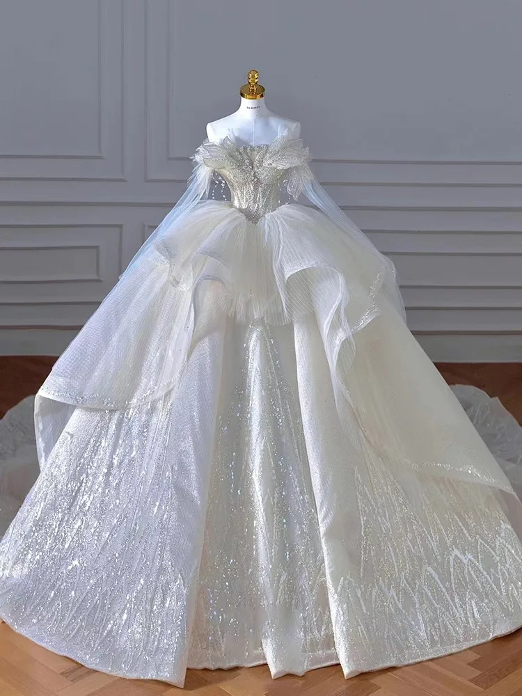 

A new one-shoulder high-quality luxurious large-tail white main fabric dress
