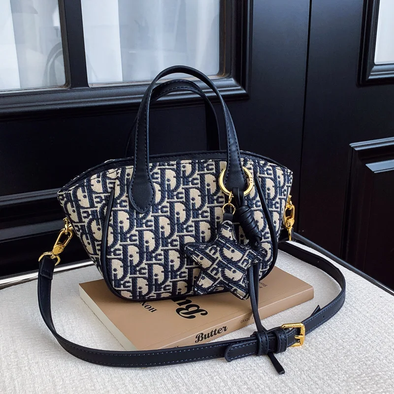 

2026 New Embroidered Monogram Small Bucket Bag Women's Chic Woven Tote Versatile Handheld Shoulder Crossbody Purse