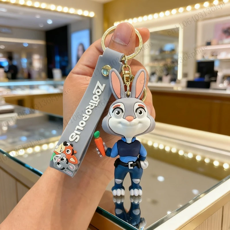 2025 ซูโทเปีย ‌   พวงกุญแจจูดี้ นิค พวงกุญแจอนิเมะ แกรี่ เดอ สเนค ‌   ตุ๊กตาช้าง พวงกุญแจ ของเล่น อุปกรณ์เสริม แฟนคลับ การ์ตูน ของขวัญน่ารัก