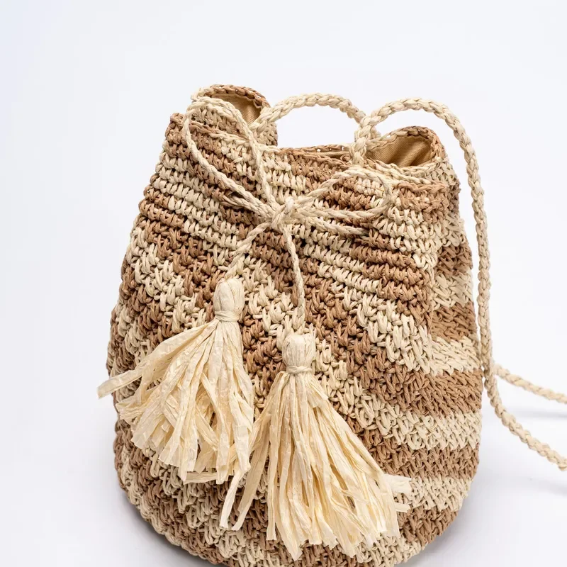 Striped straw handwoven messenger bag for women with contrasting details beach holiday shoulder bag lightweight summer view 3