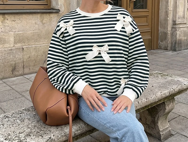 2026 New Casual Retro Style Striped Lace-up Round Neck Long-sleeved Sweater Women