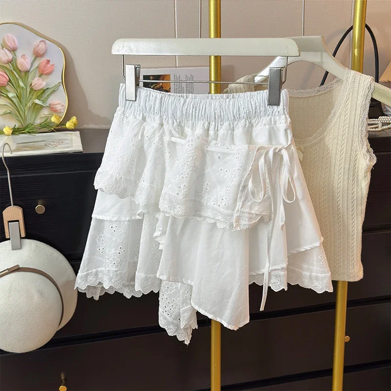 Irregular Design White Cake Skirts Women 2025 Spring Sweet Embroidery Hollowed Out Lace Up Fluffy Short Skirt Casual
