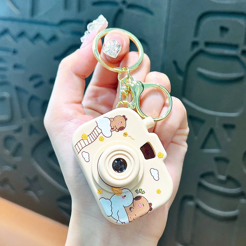 Creative Swimming Capibara Eight Patterns Projection Camera Keychain Cute Ride Bird Flying Capybara Animal Key Chain Bag Pendant