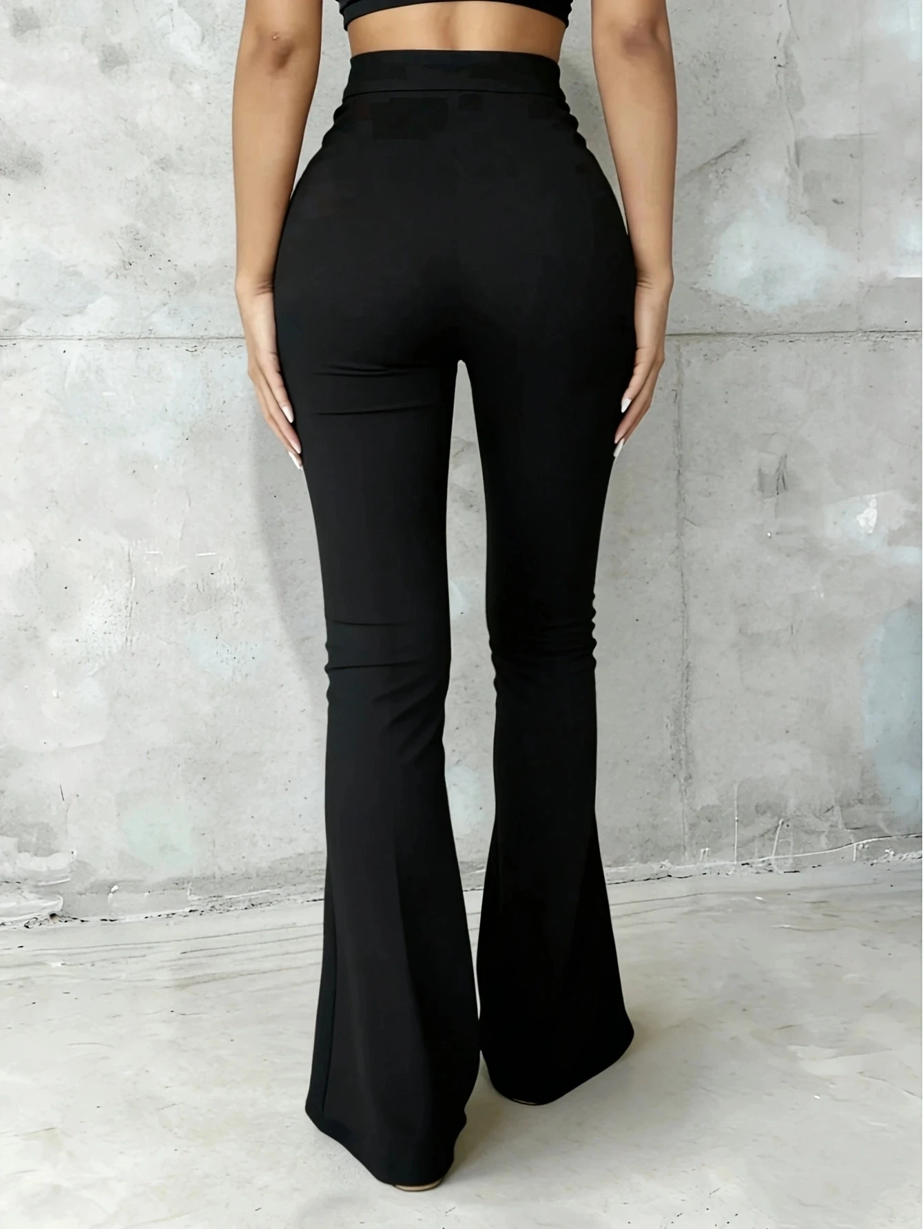 High-waist flared pants for women, featuring a front seam design, button closure, elastic black trousers suitable for both casua
