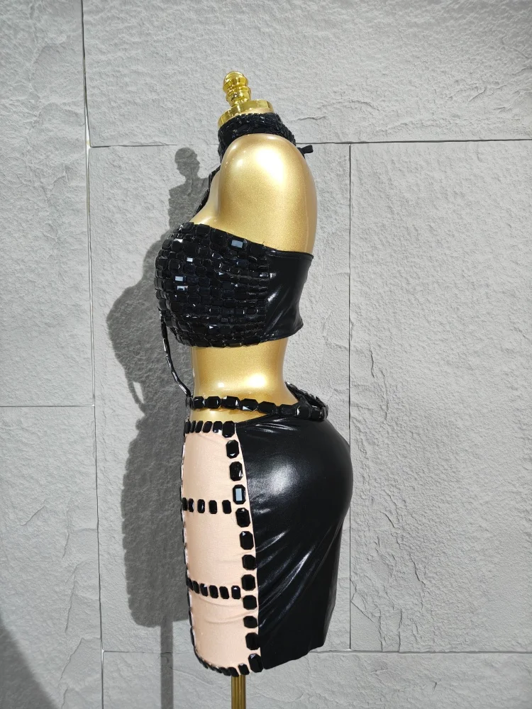 Ensemble haut et mini jupe en cristal noir sexy de luxe pour femmes, tenue de soirée moulante pour les clubs de soirée, les étapes et les nuits, 2025
