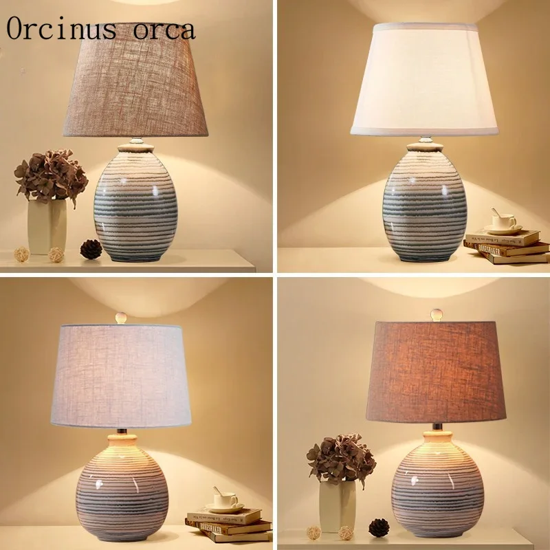 New Chinese classic cloth art desk lamp bedroom bedside lamp modern simple and creative manual ceramic table lamp free shipping