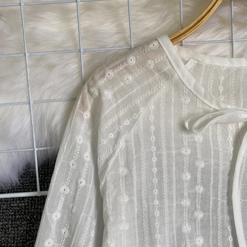 

White Lace irt Women's Korean Version Hollow out Belted Long Sve Base irt Design Sense Autumn Commute Sle Pure Color