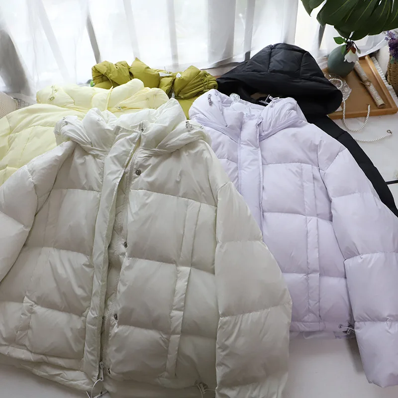 Coréen Sle femmes bouffantes Jaet à capuche jaune Thiened pain Sle ort manteau chaud Long Sve Nylon tissu fermeture à glissière