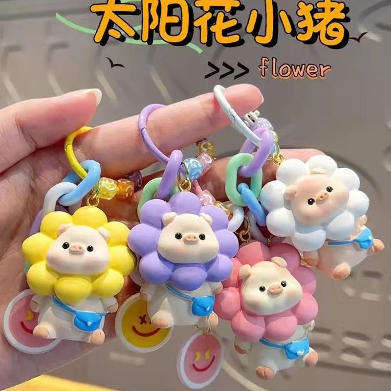 

Best-selling cute sunflower pig couple keychain, trendy creative girl bag hanging ornament, jewelry accessory