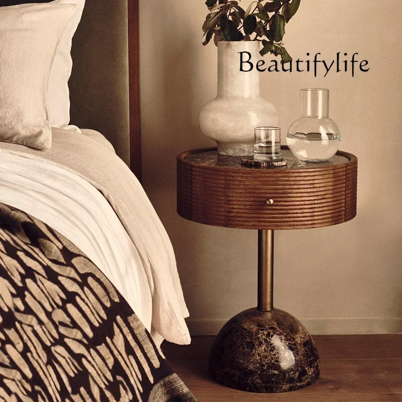 

small apartment wabi sandy wind rock slab countertop storage table X Designer round bedside table Nordic simple modern