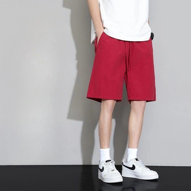 

New Style Men's Summer Shorts Made of Ice Silk Material Quick-Dry Breathable Elastic for Sports Beach and Outdoor Use 2026